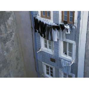  Laundry Hanging Outside Windows in the Alfama Section of 