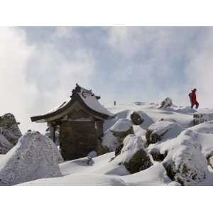 Shrine and Climber on Snow Covered Iwaki San Mountain, Aomori 