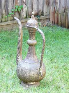 This is an Antique Arabic Brass Pot (has dents and broken arm  see 