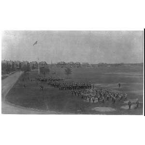  U.S. Army units in full dress on parade grounds,led by band 