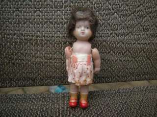   mean Celluloid doll with mohair wig haunted ghostly face 4 red shoes