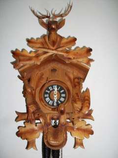 in excellent condition, all hand carved wood, deer in wood, no glue 