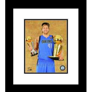   Nowitzki with NBA Champions and Finals MVP Trophies