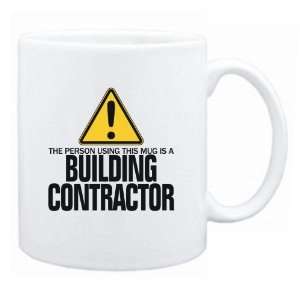  New  The Person Using This Mug Is A Building Contractor 
