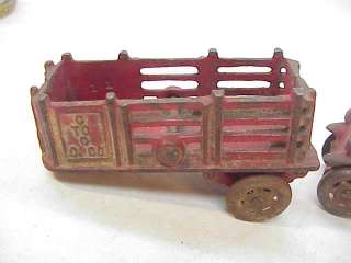 ANTIQUE AC WILLIAMS CAST IRON TRUCK STAKE TRAILER toy  