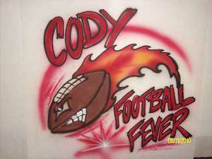 Airbrush football with flame T shirt personalized  