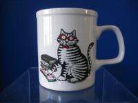White Ceramic Coffee Mug with Black and White Striped Cat with Red 