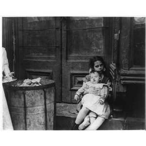   Charity   a little girl minding a baby,c1900,Jacob A Riis,Photographer