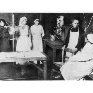 Marie Curie Explains to a Group of Nurses the Potential Benefits of 