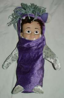   Boo doll girl in purple monster costume from monsters inc. 13  