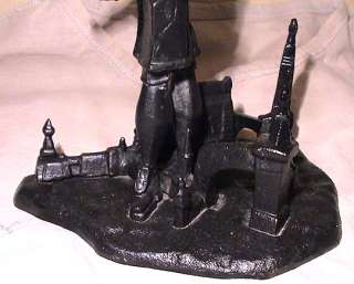 this cast iron figurine was made in russia by artist