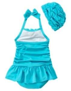 This adorable swimsuit is from Gymboree. Swimsuit and swim cap are 